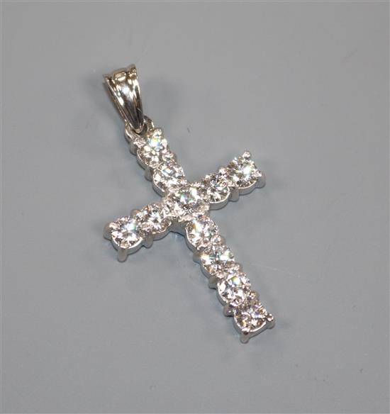 A modern 18ct white gold and diamond set cross pendant, 28mm.